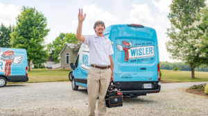 Wisler AC technician waiving hello.