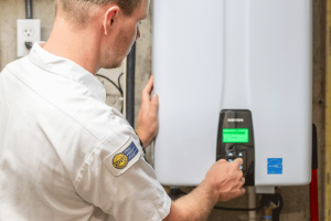 Wisler Installing a tankless water heater.